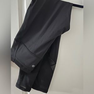 Lululemon Athletica size 10 Black Leggings with Mesh Side Panels